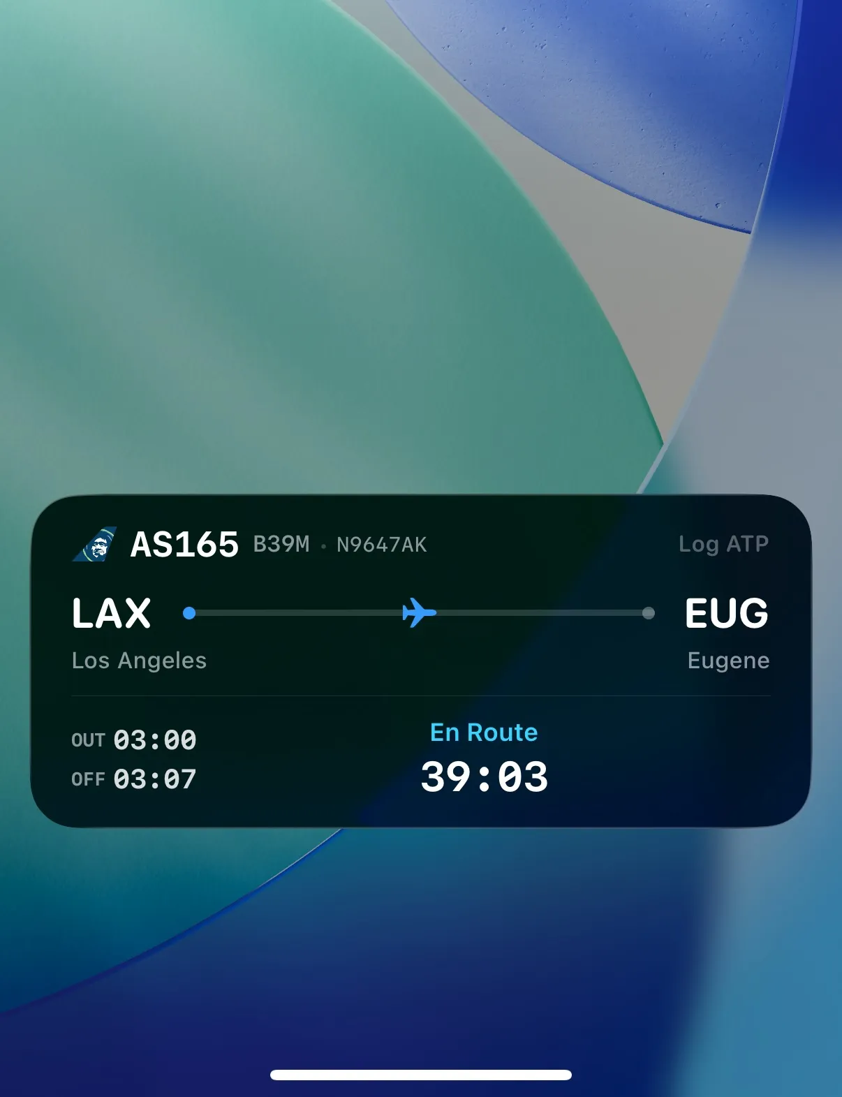 Live Activity on Lock Screen showing flight AS165 LAX to EUG
